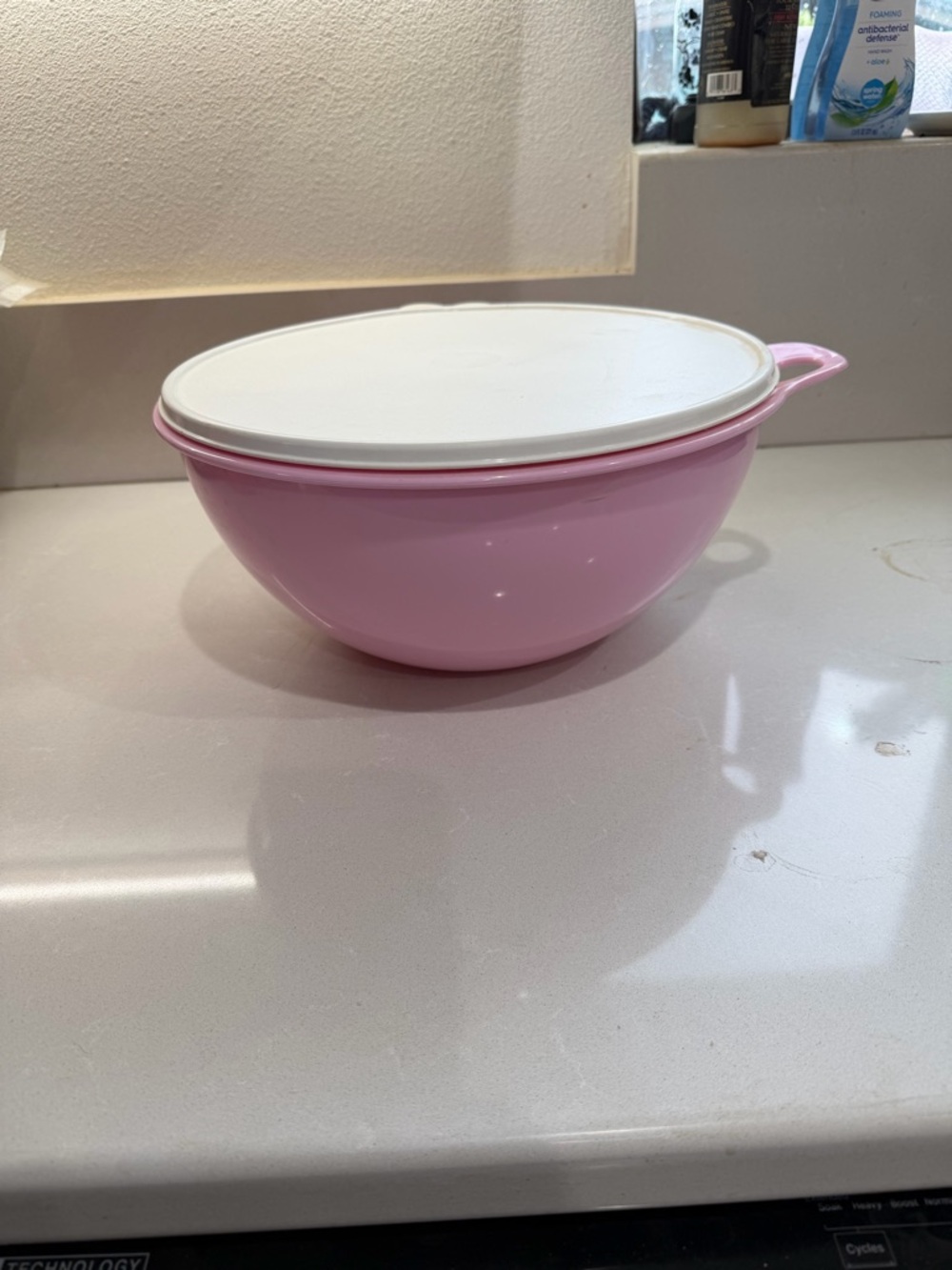 Tupperware Light Pink 32-Cup Mixing Bowl. That’s a bowl. New